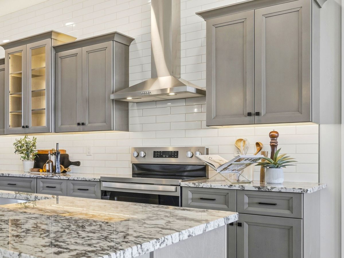 Quartz island with turned legs and glass pendants
